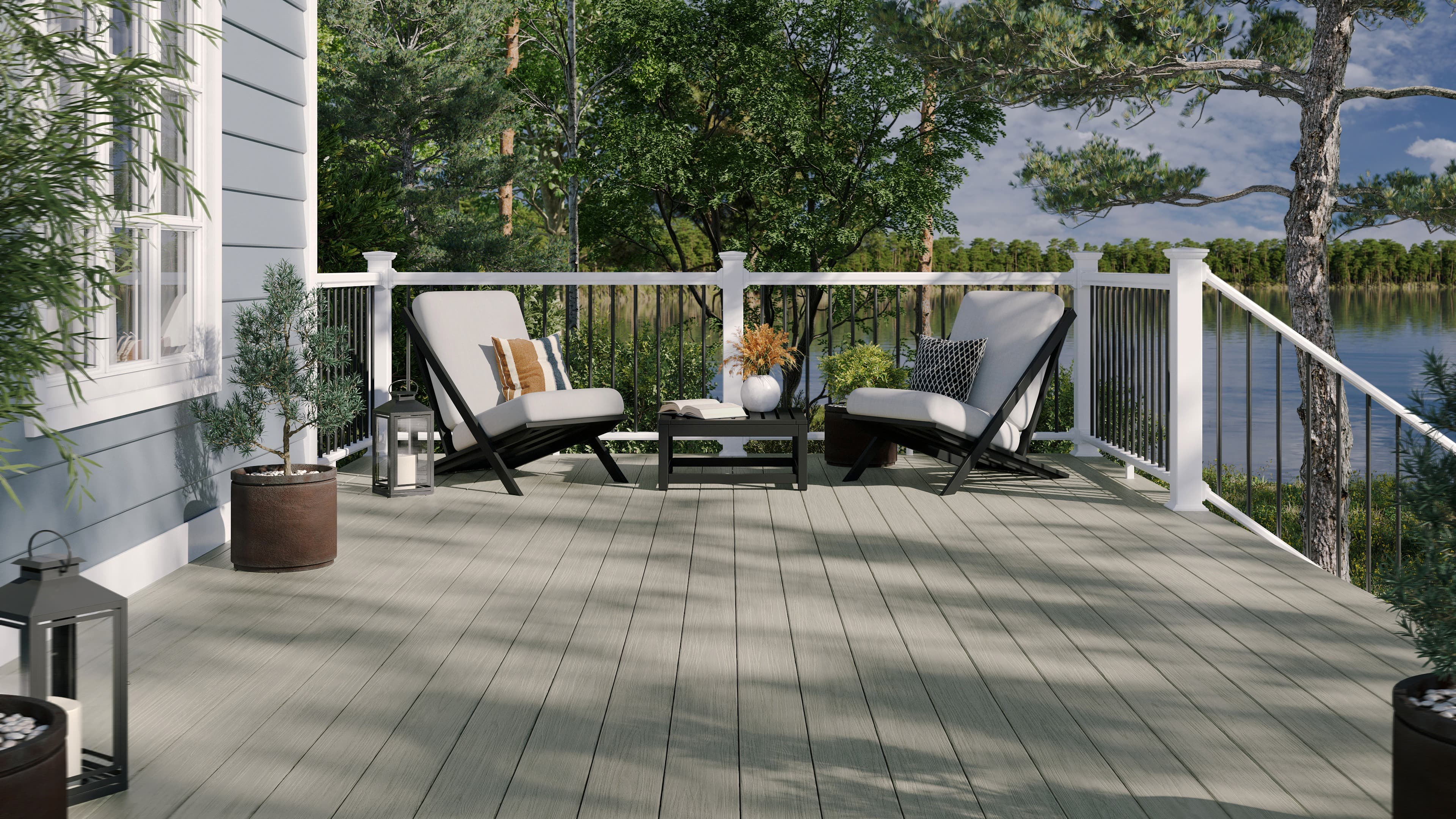 Deckorators Summit Glacier decking with contemporary composite railing at a lake house