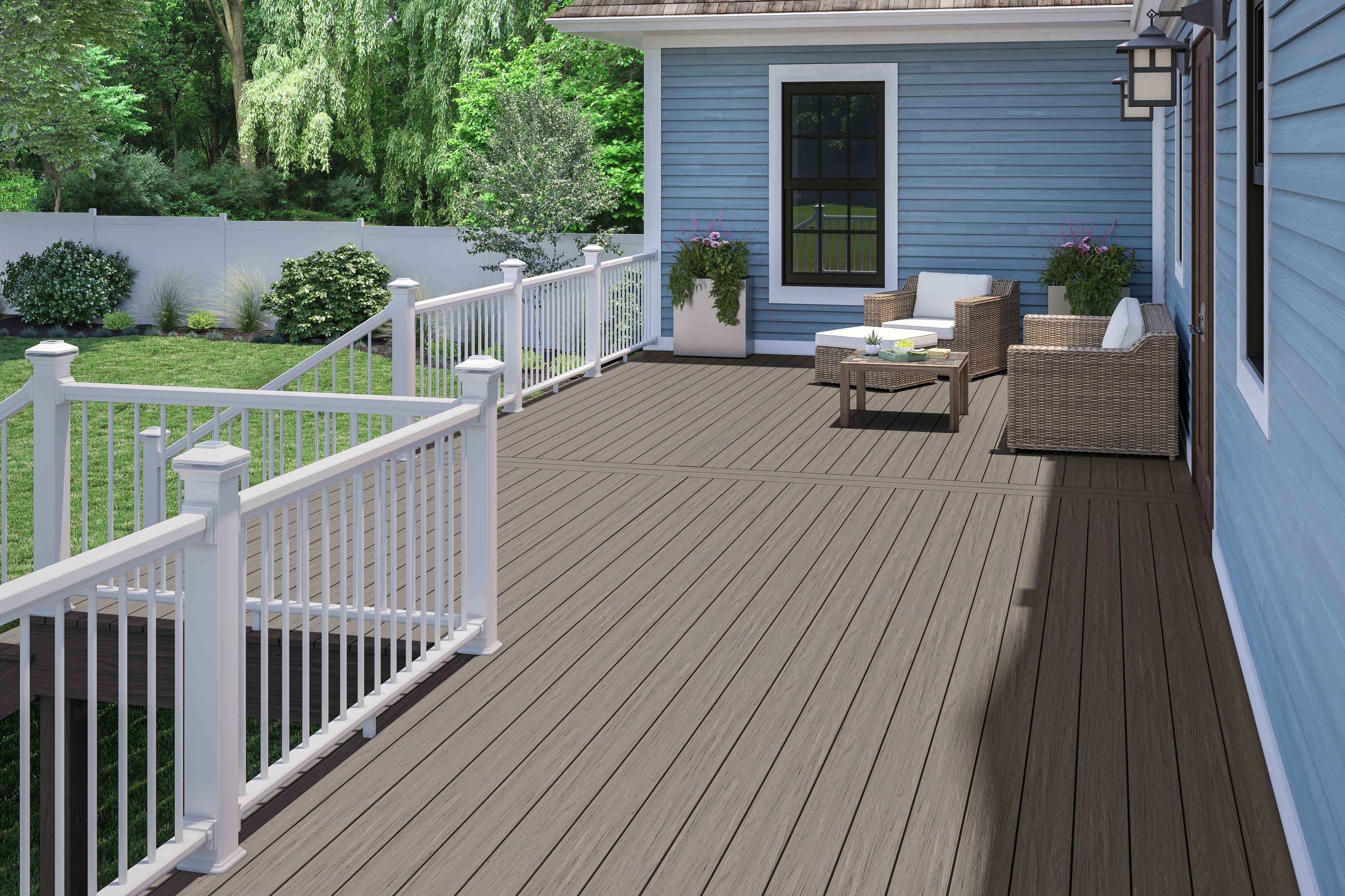 Deckorators Venture Saltwater decking with composite railing and white balusters