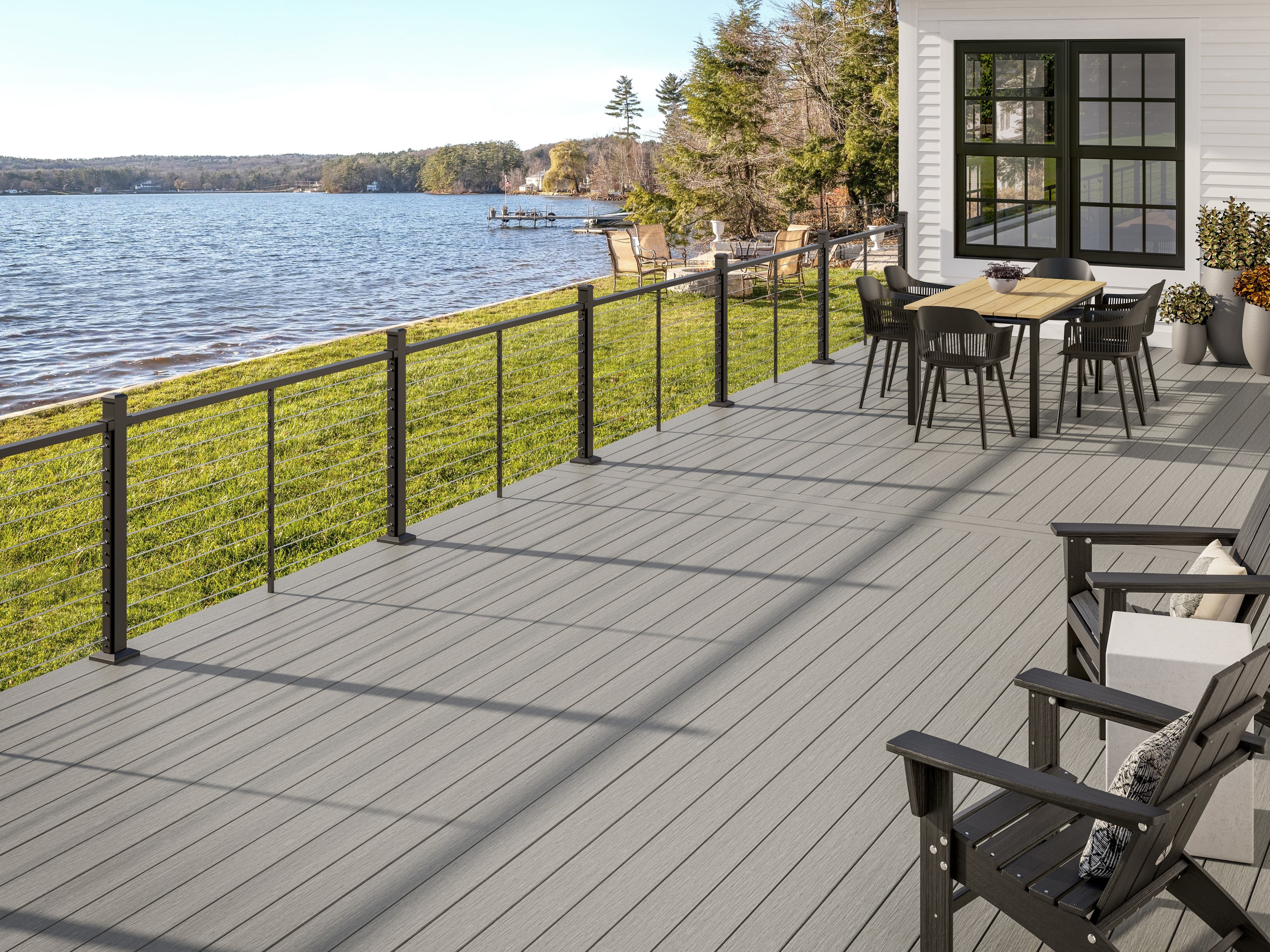 Deckorators Vista Silverwood decking with Revolution rod rail and lake view