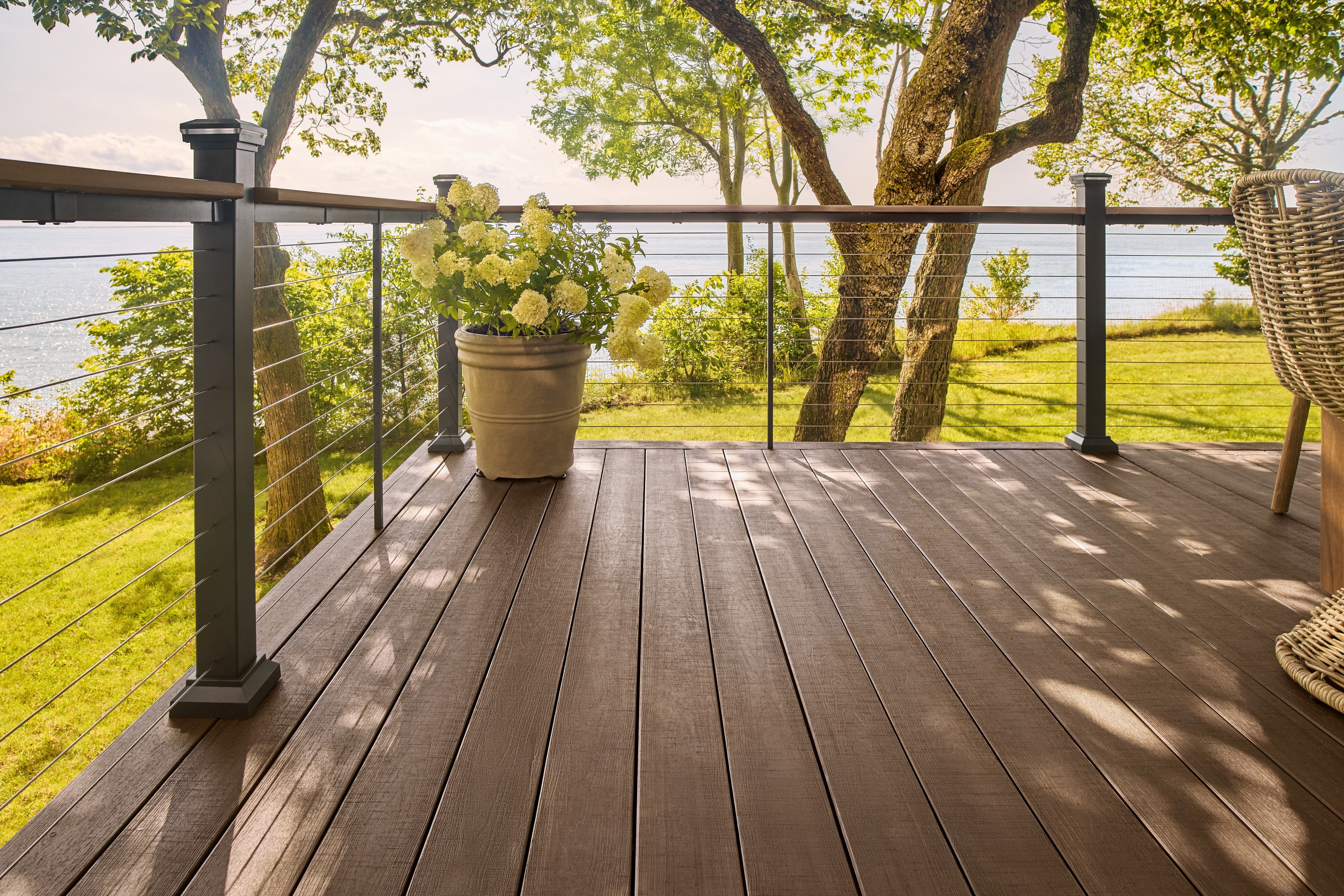 TimberTech Landmark American Walnut deck at twilight with lighting